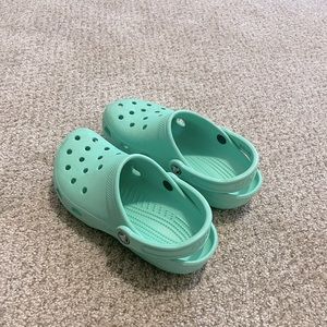 Mint green crocs !